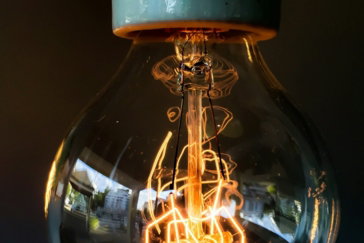turned-on-clear-glass-light-bulb.jpg turned on clear glass light bulb